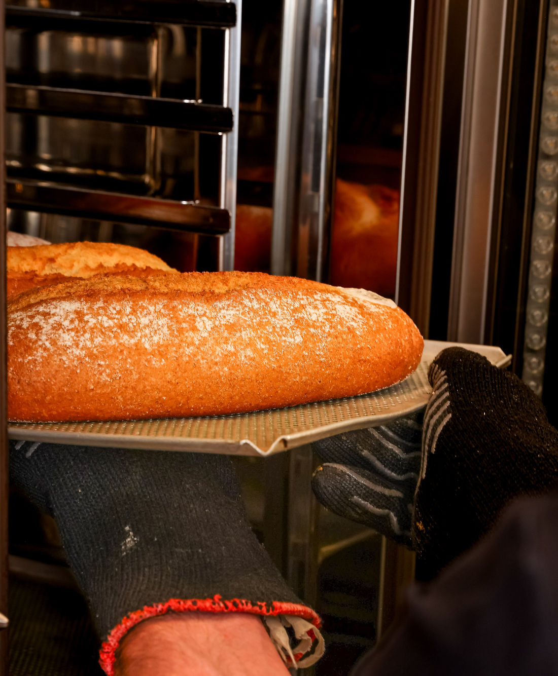 Bread out of the oven on the old bakery floor Tom Mayo cleared.