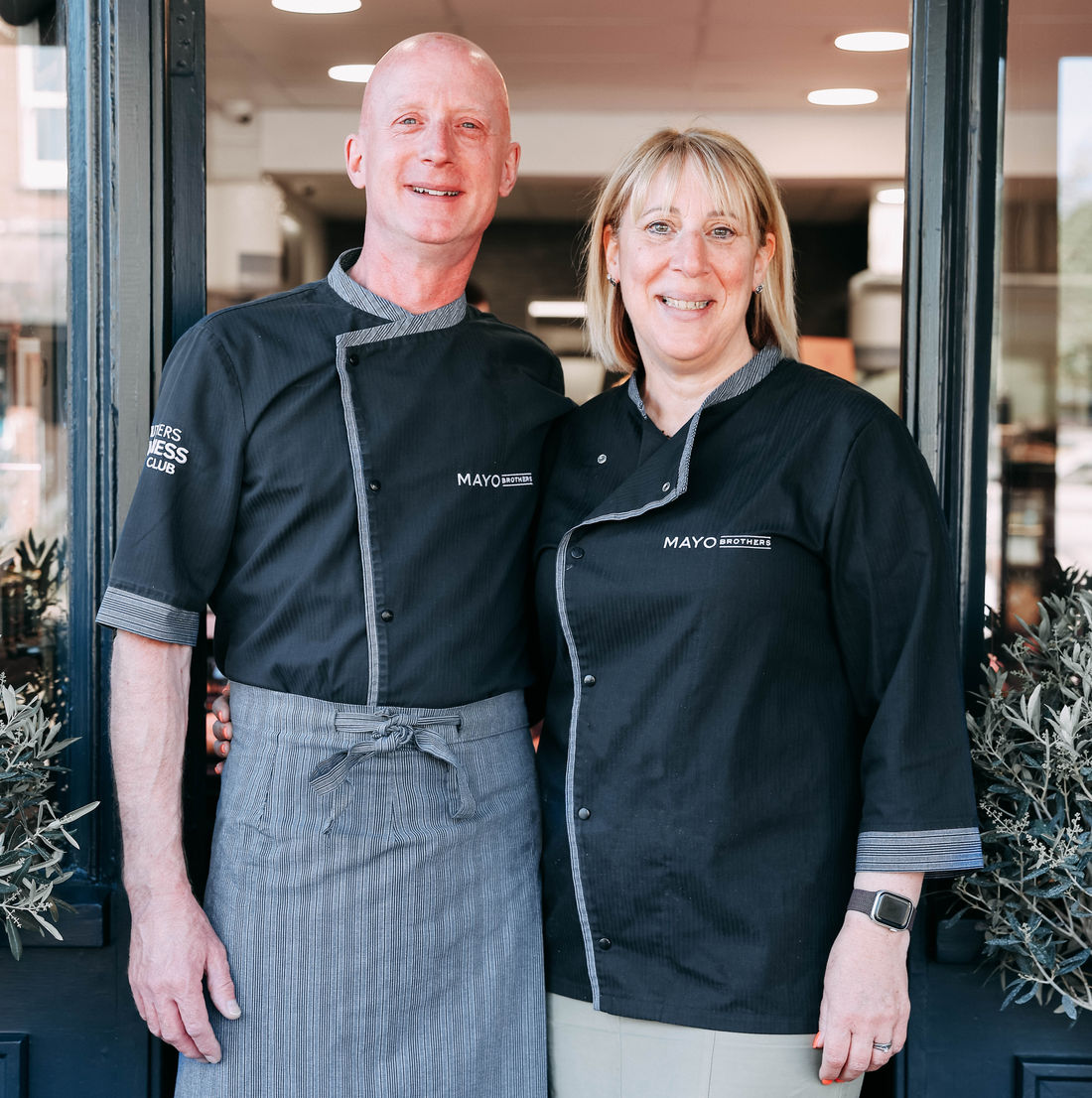 Rob and Jenni Sawyer at the door of Mayo Brothers on Bois Lane, Amersham