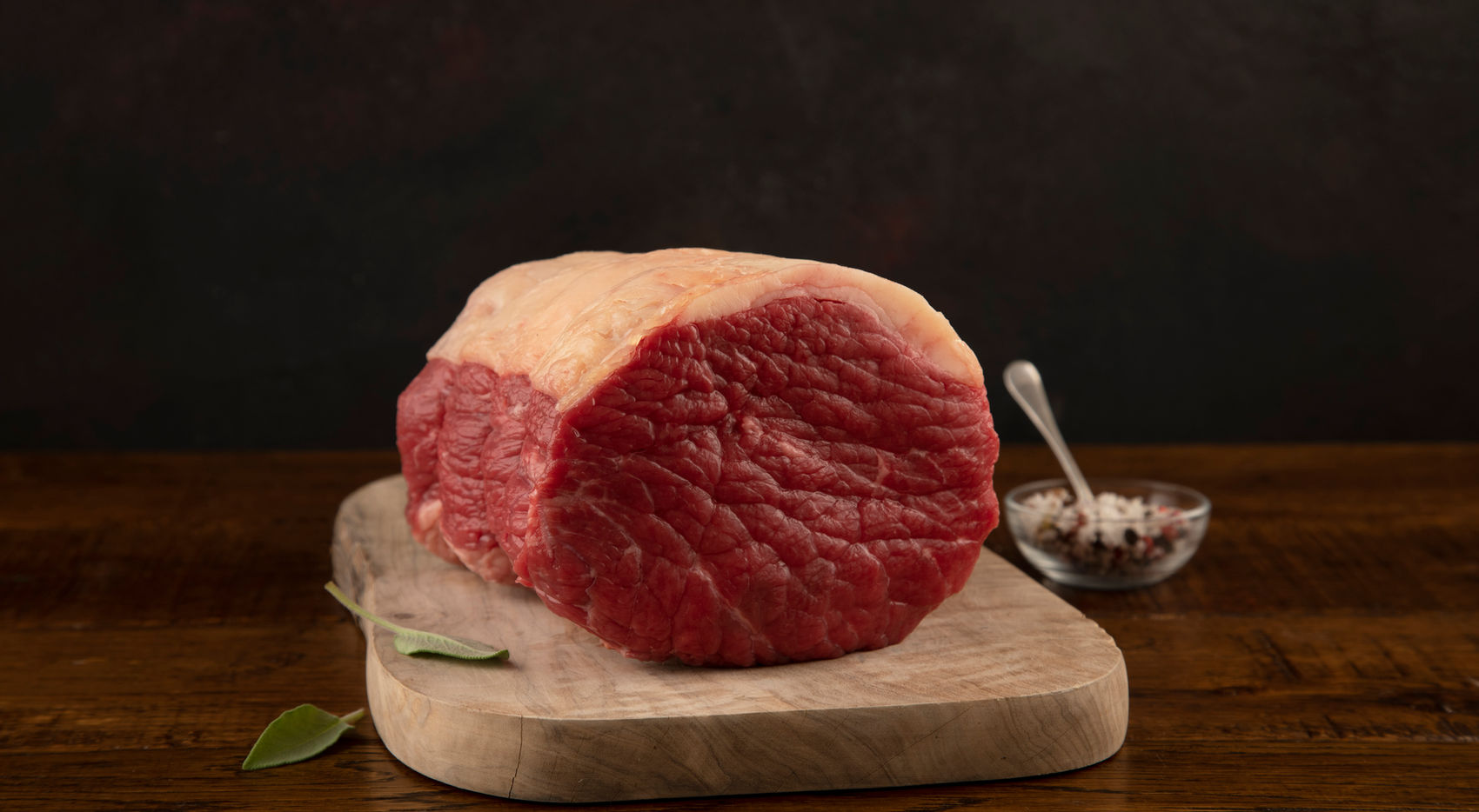 A dry-aged silverside joint of grass-fed Scotch beef on a wooden board at Mayo Brothers